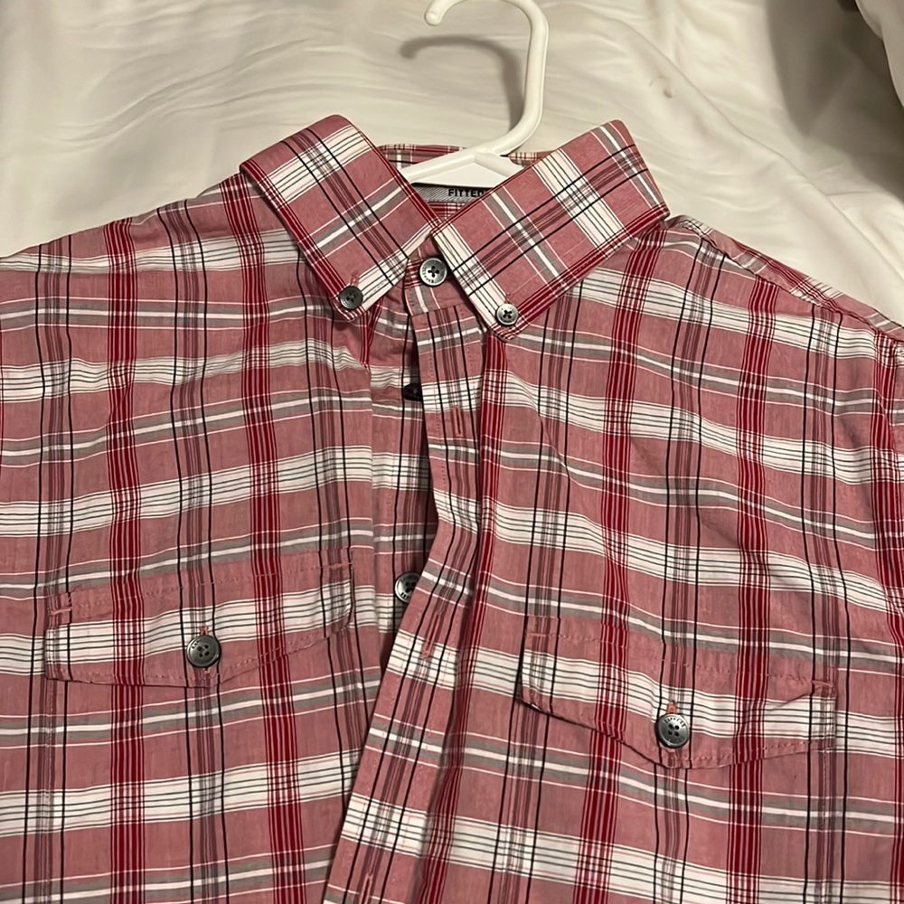This is an Express Long Sleeved pink and white striped Button Down